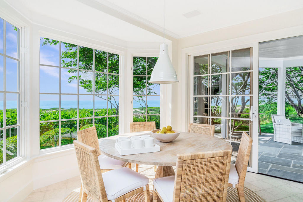 Dining area overlooking water at 32 Windmill Lane