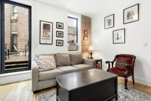 East Harlem living room with private deck - apartments near Central Park