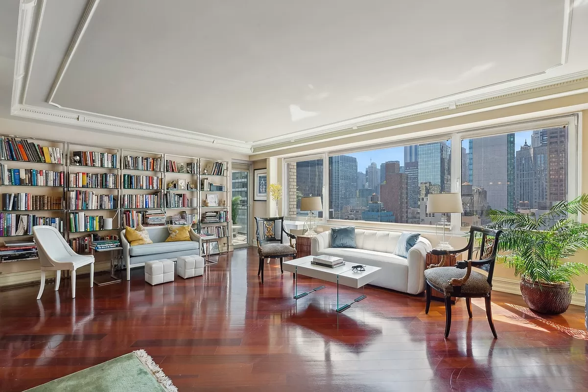 Sutton Place living room library with balcony - Manhattan homes with balconies