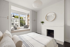 bedroom with fireplace in Cobble Hill 2-bedroom