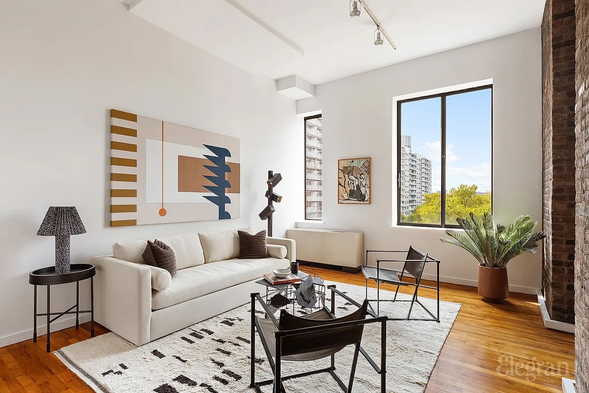 living room with exposed brick in Greenwich Village 1-bedroom