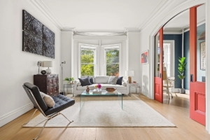 red doors in artsy Park Slope co-op living room - fall neighborhoods