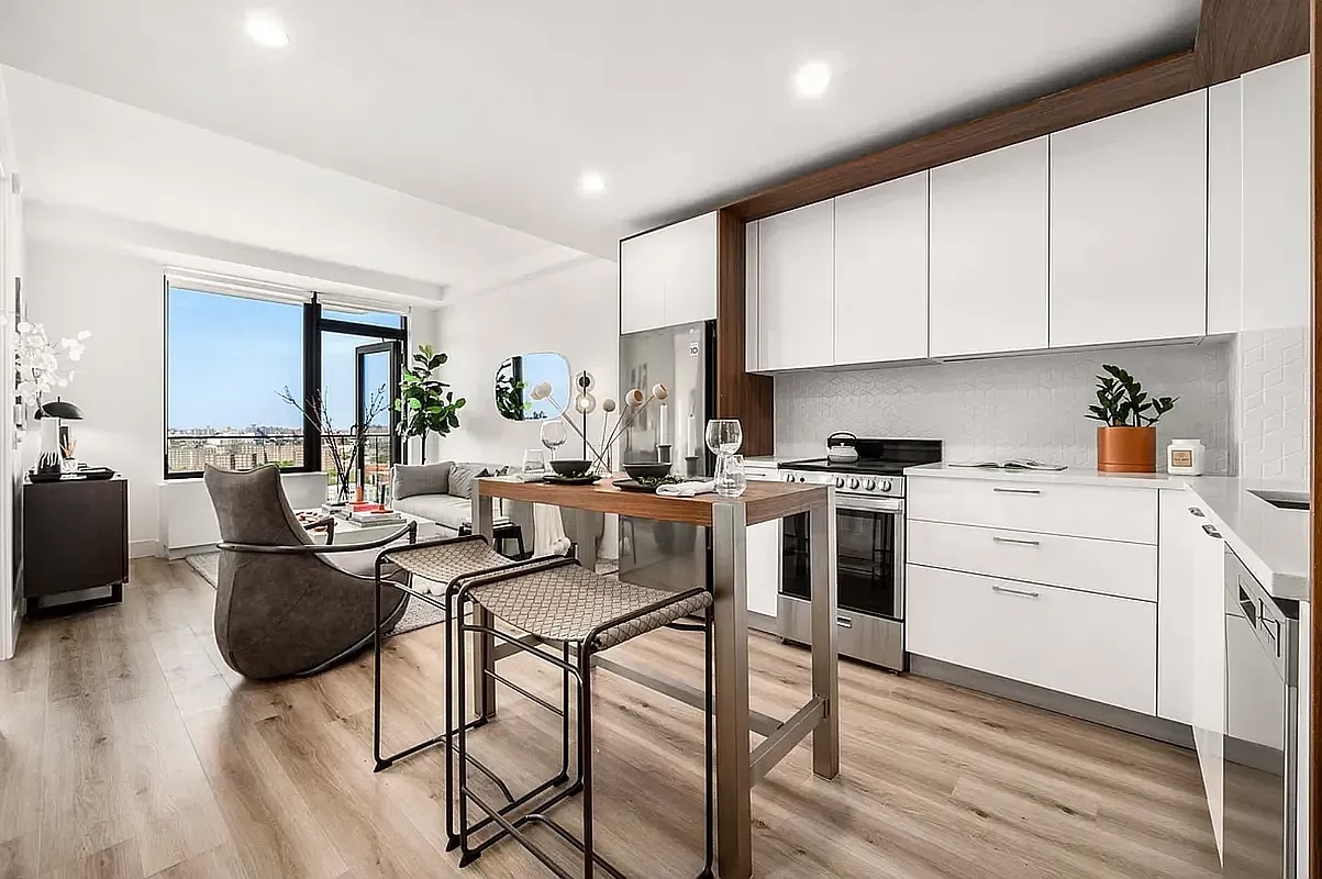 kitchen and living room in Mott Haven apartment with balcony - private outdoor space