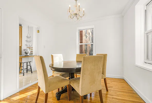 dining room with chandelier in Forest Hills homes