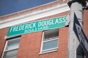 image of frederick douglass boulevard sign in new york city