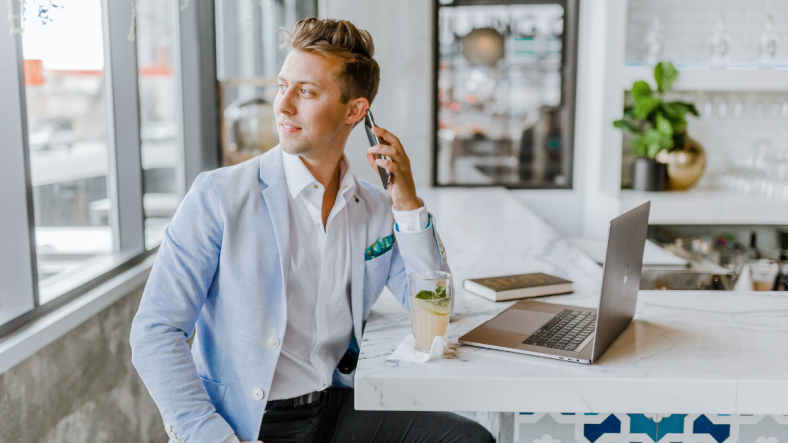 Young businessman having a phone call